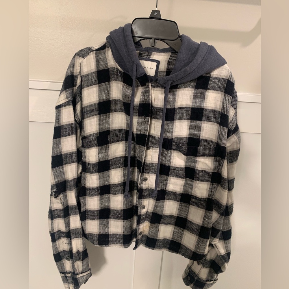 American Eagle flannel with hoodie. Size Large. In great shape. Button up.
